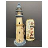 Wooden lighthouse and wall art hanging
