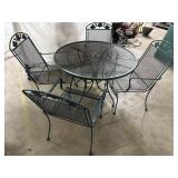 Wrought iron table & 4 chairs