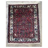 Oriental rug made in Iran, 30in x 24in