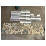 5 small rugs.  2 green & white bathroom set, rug