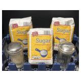 3 - 4lb bags of sugar and 2 sugar dispensers