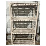 Plastic 4 tier shelf. Approx 33.5 x 14 x 56in tall