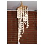 Decorative sea shell hanging wind chime  located