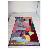 Small crazy quilt; appears to be polyester;