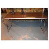 Vintage folding table; measures approx. 63 in x