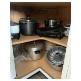 CONTENTS OF CABINET IN KITCHEN - SLOW COOKERS,