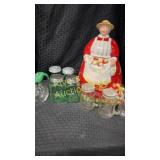 Cookie jar with assortment of salt and pepper