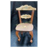 Small wooden toy chair.