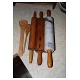 Marble and wooden rolling pins and wooden spoons