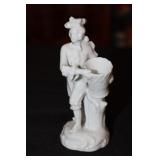 Porcelain figural toothpick holder man holding a