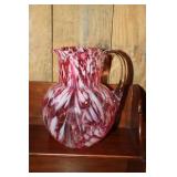 Cranberry and opalescent art glass pitcher