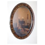 Oval shaped wooden framed mirror 16.5 X 22.5