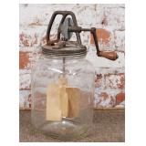 A Vintage Glass Butter Churn