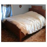 A Eastlake Victorian Walnut Bedstead,