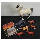 Group of toy horses and harvest Heritage trading