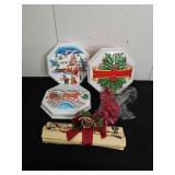 Three vintage plastic Christmas containers, red