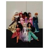 Group of Barbies and Disney princesses