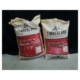 Two new 40 lb bags of Timberland premium wood