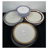 Different sets of dinner plates there are some