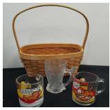 Wicker basket with two vintage Garfield coffee