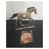 Collectible trail of Painted Ponies numbered