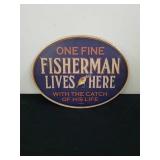 12.25x9.5-in metal fisherman lives here sign