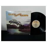 Vintage Ozark Mountain Daredevils the car over