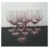 Eight purple wine glasses