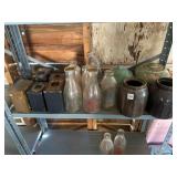 glass milk bottles, pots, cameras