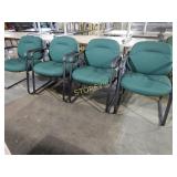 Green guest chairs on black metal frame