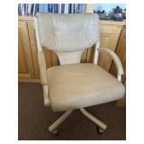 2 Rolling tan office chair