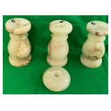 F - 4 CARVED STONE CANDLE HOLDERS (J33