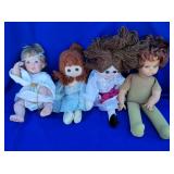 T - LOT OF 4 COLLECTIBLE DOLLS (B105)