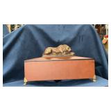 Wooden box with lion on it