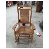 OAK ROCKING CHAIR - SOME SCUFFING ON CANE -  26 INCHES WIDE AND 19 INCHES FLOOR TO SEAT