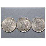 Three (3) 1922-P Peace Silver Dollars,