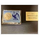 R1- AMERICAN EAGLE SILVER DOLLAR