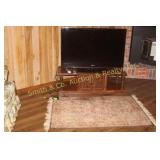 Samsung Flat Screen TV, Coffee Table, Area Rug