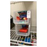 Office supplies with plastic stacking shelves