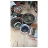 Lot of flower pots and bowls and cardboard box