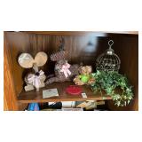 Shelf lot with spring decorations, bear plush,