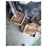 Burlap bags ladder and misc items on shed floor