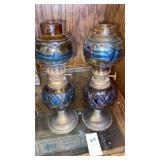 2 oil lamps. Metal , 9 inch tall