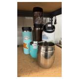 Assortment of to go travel mugs