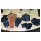 Pistol Holsters + Tactical Holders