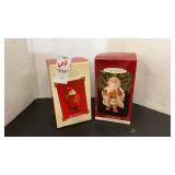 two Hallmark Santa ornaments