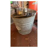 Assortment of metal buckets along with one water