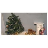 Mini Christmas tree, small nativity scene,  and