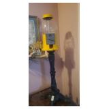 Antique YELLOW Gumball machine on cast iron stand