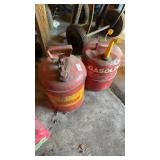 Two metal gas cans